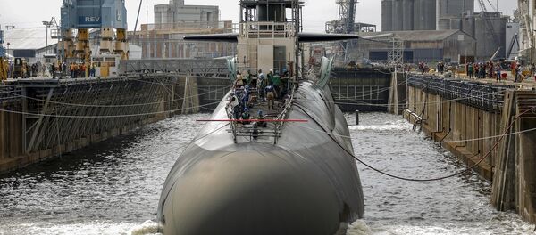 A submarine in one of the Norfolk Naval Shipyard's dry docks, which can be pumped dry to allow repairs on a vessel A submarine in one of the Norfolk Naval Shipyard's dry docks, which can be pumped dry to allow repairs on a vessel - Sputnik International