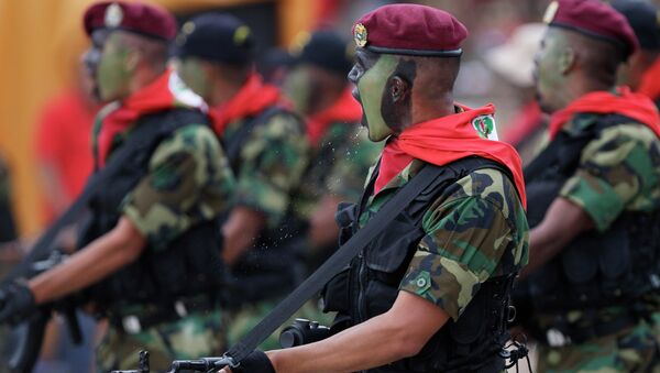 Soldiers march during a military parade commemorating the 20th anniversary of the failed coup attempt by President Hugo Chavez in Caracas, Venezuela - Sputnik International
