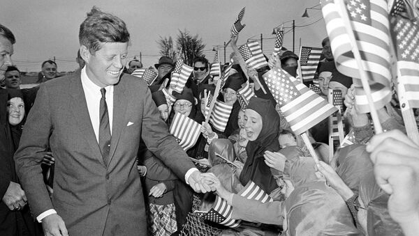 U.S. President John F. Kennedy is greeted by an enthusiastic crowd of children and nuns from the Convent of Mercy, as he arrives from Dublin by helicopter at Galway's sports ground, Ireland, June 29, 1963.  - Sputnik International