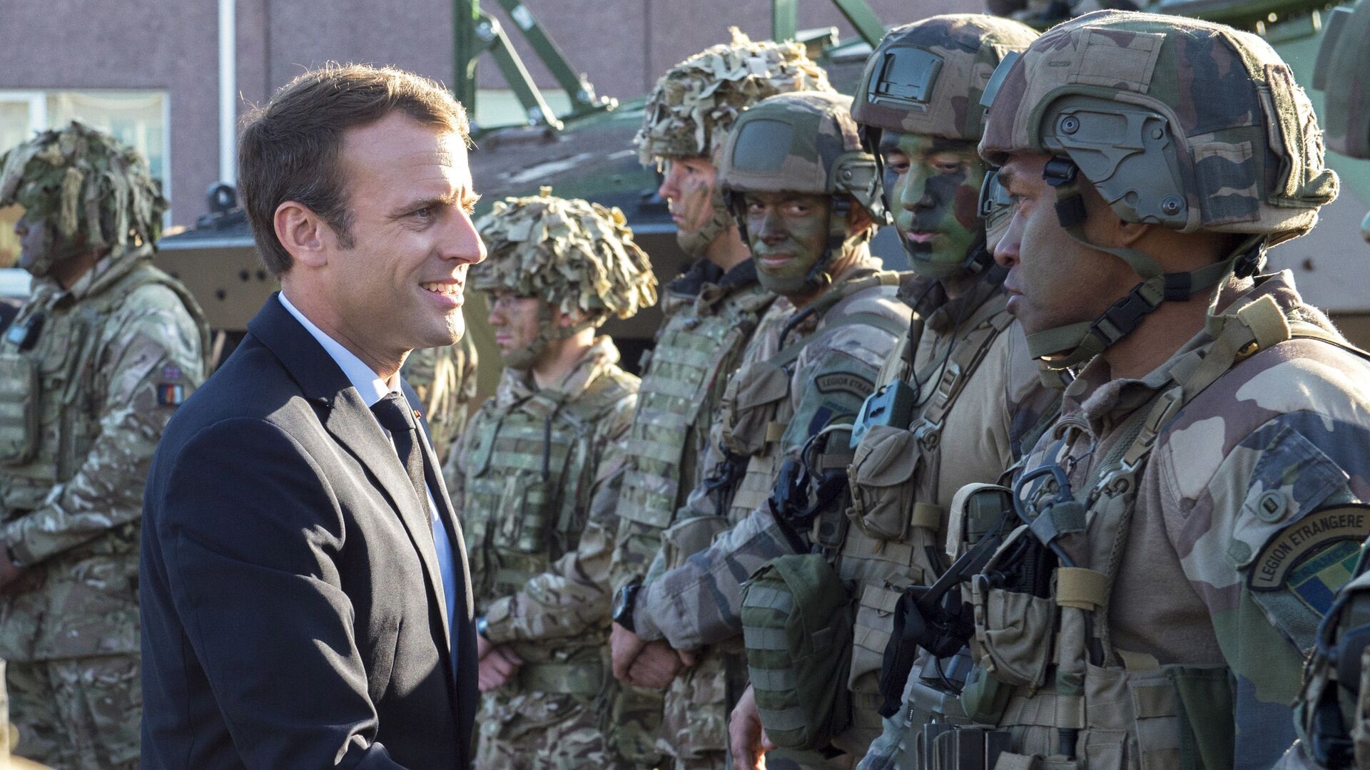 FILE - In this Friday, Sept. 29, 2017 file photo, France's President Emmanuel Macron, left, shakes hands with French soldiers of the NATO Battle Group at the Tapa military base, about 90 kilometers (56 miles) west of Tallinn, Estonia - Sputnik International, 1920, 23.01.2022