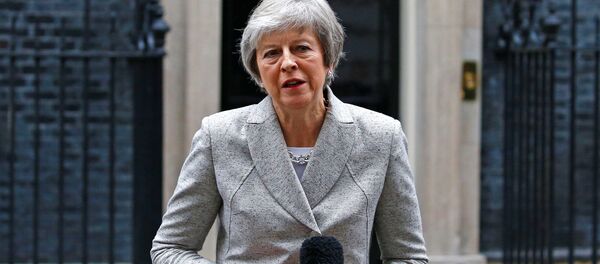 Britain's Prime Minister Theresa May addresses the media outside 10 Downing Street in London, Britain, November 22, 2018. Britain's Prime Minister Theresa May addresses the media outside 10 Downing Street in London, Britain, November 22, 2018. - Sputnik International