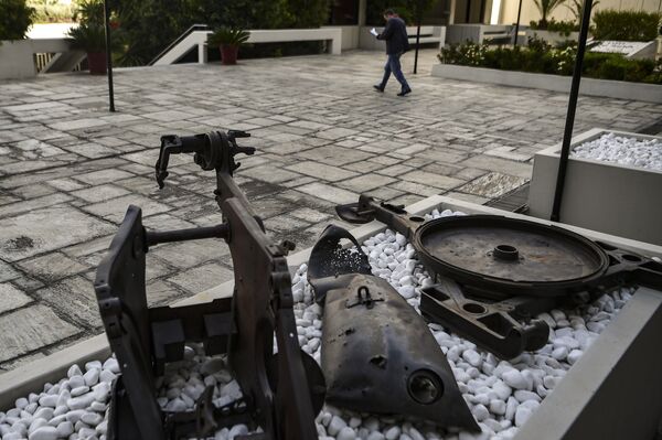 A man walks past remains of a US-made napalm bomb used in the 1944-1949 Greek Civil War A man walks past remains of a US-made napalm bomb used in the 1944-1949 Greek Civil War - Sputnik International