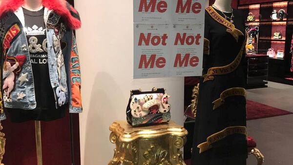 The prints of Stefano Gabbana's Instagram post having written 'Not Me' are seen on a Dolce & Gabbana window store in Shanghai, China November 21, 2018 in this image obtained from social media on November 22, 2018 - Sputnik International