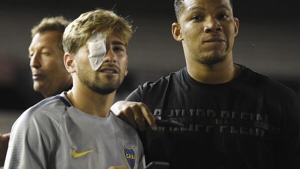 Gonzalo Lamardo was one of two Boca Juniors players who had glass shards embedded in their eye after the incident - Sputnik International