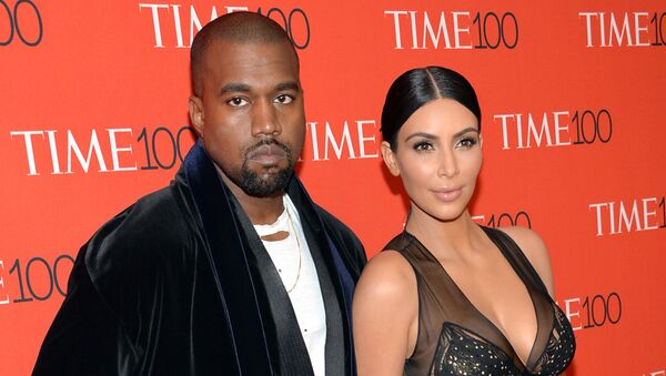 In this April 21, 2015 file photo, Kanye West, left, and Kim Kardashian attend the TIME 100 Gala, in New York. Kardashian and West are expecting a baby boy, the reality TV star's spokesperson confirmed Monday, June 22, 2015. - Sputnik International