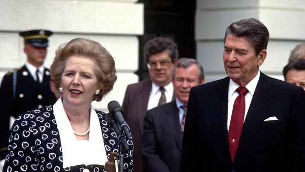 In a Friday, July 17, 1987 file photo, Prime Minister Margaret Thatcher of the United Kingdom, left, makes remarks after visiting United States President Ronald Reagan, right, at the White House in Washington, D.C. - Sputnik International