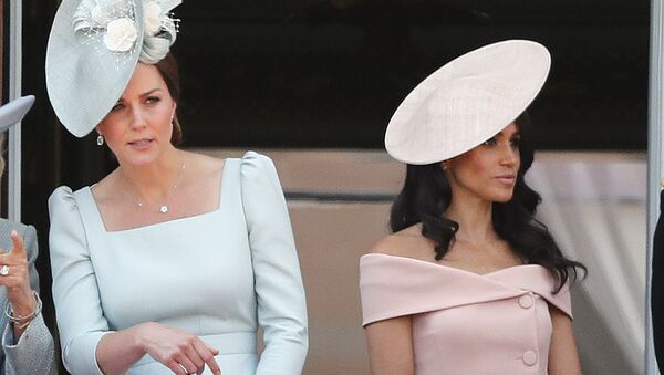 Britain's Kate, the Duchess of Cambridge, left, and Meghan, the Duchess of Sussex attend the annual Trooping the Colour Ceremony in London, Saturday, June 9, 2018.(AP Photo/Frank Augstein) - Sputnik International