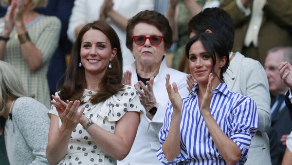 Kate, Duchess of Cambridge and Meghan, Duchess of Sussex, right, applaud during the women's singles final match between Serena Williams of the US and Angelique Kerber of Germany at the Wimbledon Tennis Championships, in London, Saturday July 14, 2018. - Sputnik International