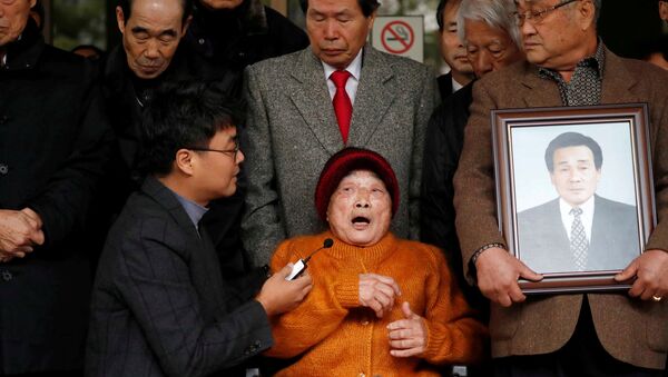 Kim Seong-ju, a victim of wartime forced labor during the Japanese colonial period, speaks after hearing the court ruling at the Supreme Court in Seoul, South Korea, - Sputnik International