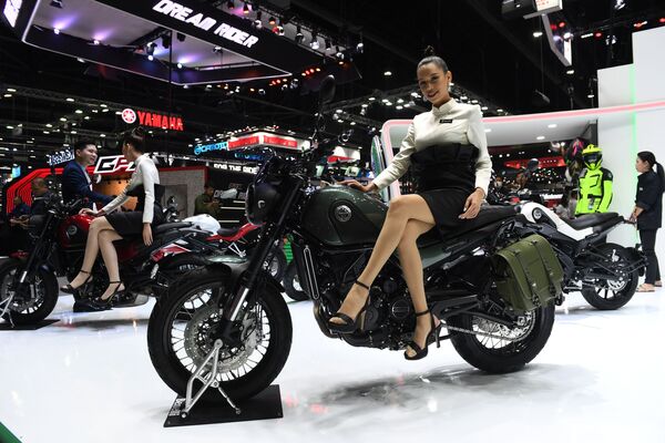 A model poses on a 2018 Benelli motorcycle during the Thailand International Motor Expo - Sputnik International