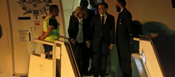 French President Emmanuel Macron and his wife Brigitte Macron arrive at Ministro Pistarini International Airport for the G20 leaders summit in Buenos Aires, Argentina November 28, 2018 - Sputnik International