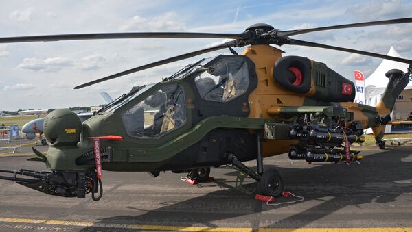 Turkish T129 ATAK chopper at an arms expo in 2014. - Sputnik International
