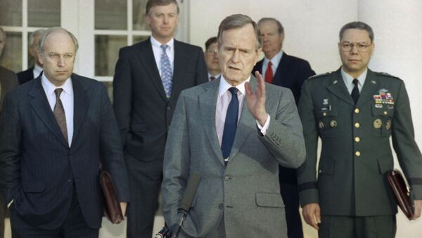 In this Feb. 11, 1991, file photo, President George H.W. Bush talks to reporters in the Rose Garden of the White House after meeting with top military advisors to discuss the Persian Gulf War - Sputnik International