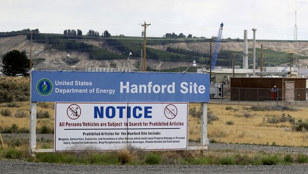 In this July 9, 2014, file photo, a sign informs visitors of prohibited items on the Hanford Nuclear Reservation near Richland, Wash - Sputnik International