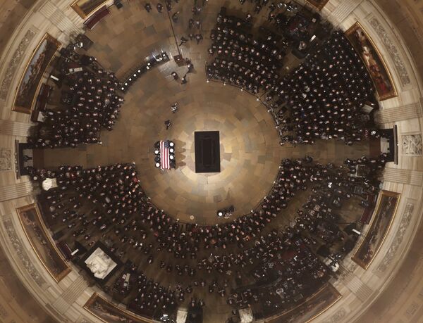 Casket of former President George H.W. Bush is carried by a joint services military honor guard into the Capitol Rotunda Casket of former President George H.W. Bush is carried by a joint services military honor guard into the Capitol Rotunda - Sputnik International