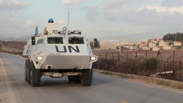 U.N. peacekeepers of the United Nations Interim Force in Lebanon (UNIFIL) patrol in Kfar Kila village in south Lebanon, near the border with Israel - Sputnik International