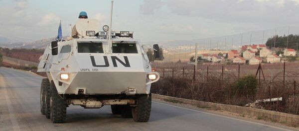 U.N. peacekeepers of the United Nations Interim Force in Lebanon (UNIFIL) patrol in Kfar Kila village in south Lebanon, near the border with Israel - Sputnik International