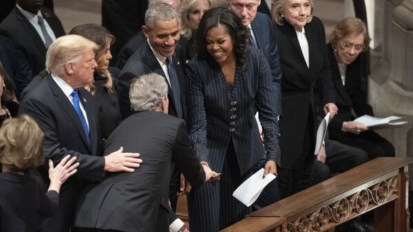 President George W. Bush and wife Laura Bush greets President Donald Trump, first lady Melania Trump, former President Barack Obama, Michelle Obama, former President Bill Clinton, former Secretary of State Hillary Clinton, former President Jimmy Carter, and Rosalynn Carter during a State Funeral for former President George H.W. Bush at the National Cathedral, Wednesday, Dec. 5, 2018, in Washington. - Sputnik International