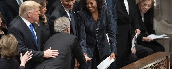 President George W. Bush and wife Laura Bush greets President Donald Trump, first lady Melania Trump, former President Barack Obama, Michelle Obama, former President Bill Clinton, former Secretary of State Hillary Clinton, former President Jimmy Carter, and Rosalynn Carter during a State Funeral for former President George H.W. Bush at the National Cathedral, Wednesday, Dec. 5, 2018, in Washington. - Sputnik International