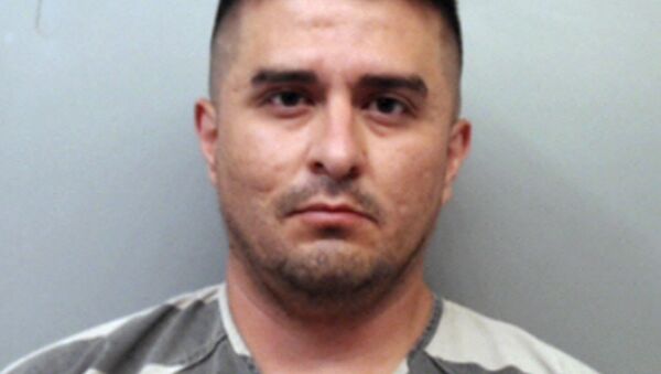 U.S. Border Patrol agent Juan David Ortiz. Ortiz, who confessed to shooting four women in the head and leaving their bodies on rural Texas roadsides, was indicted Wednesday, Dec. 5, 2018, on a capital murder charge - Sputnik International
