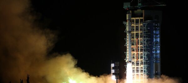 In this photo released by China's Xinhua News Agency, a Long March-2D rocket carrying the world's first quantum satellite lifts off from the Jiuquan Satellite Launch Center in Jiuquan, northwestern China's Gansu Province, early Tuesday, Aug. 16, 2016 - Sputnik International