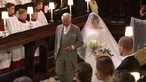 In this frame from video, Meghan Markle walks down the aisle with Prince Charles for her wedding ceremony at St. George's Chapel in Windsor Castle in Windsor, near London, England, Saturday, May 19, 2018. - Sputnik International