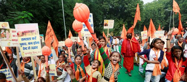 People shout slogans during a demonstration organised by the Hindu hardline group United Hindu Front to mark the 26th anniversary of the razing of a 16th century Babri mosque by a Hindu mob in the town of Ayodhya, in New Delhi, India, December 6, 2018 People shout slogans during a demonstration organised by the Hindu hardline group United Hindu Front to mark the 26th anniversary of the razing of a 16th century Babri mosque by a Hindu mob in the town of Ayodhya, in New Delhi, India, December 6, 2018 - Sputnik International