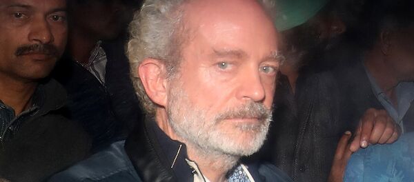 Christian Michel, a key accused and alleged middleman in India's abortive, scandal-tainted helicopter deal with Anglo-Italian firm Agusta Westland, is pictured inside a police vehicle outside a court in New Delhi, India, December 5, 2018 Christian Michel, a key accused and alleged middleman in India's abortive, scandal-tainted helicopter deal with Anglo-Italian firm Agusta Westland, is pictured inside a police vehicle outside a court in New Delhi, India, December 5, 2018 - Sputnik International