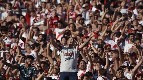 River Plate fans ahead of the second leg of the Copa Libertadores final, which is being played in Madrid on December 9 - Sputnik International