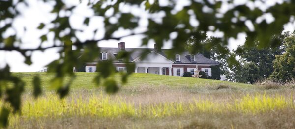 The clubhouse of Trump National Golf Club is seen from the media van, Thursday, Aug. 9, 2018, Bedminster, N.J., before a President Donald Trump meets with state leaders about prison reform.(AP Photo/Carolyn Kaster) The clubhouse of Trump National Golf Club is seen from the media van, Thursday, Aug. 9, 2018, Bedminster, N.J., before a President Donald Trump meets with state leaders about prison reform.(AP Photo/Carolyn Kaster) - Sputnik International