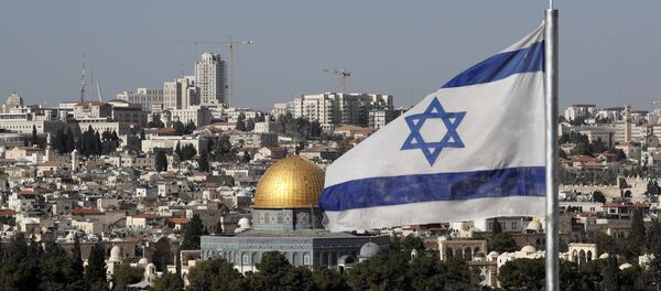 The Israeli flag flutters in front of the Dome of the Rock mosque and the city of Jerusalem, on December 1, 2017 The Israeli flag flutters in front of the Dome of the Rock mosque and the city of Jerusalem, on December 1, 2017 - Sputnik International