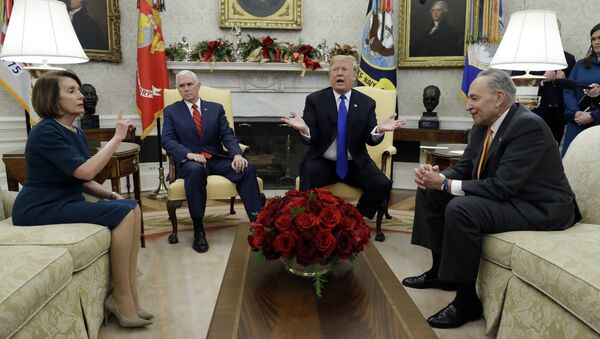 President Donald Trump and Vice President Mike Pence meet with Senate Minority Leader Chuck Schumer, D-N.Y., and House Minority Leader Nancy Pelosi, D-Calif., in the Oval Office of the White House, Tuesday, Dec. 11, 2018, in Washington. - Sputnik International
