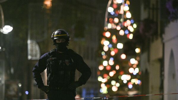 A policeman patrols in the rue des Grandes Arcades in Strasbourg, eastern France, after a shooting breakout, on December 11, 2018. - Sputnik International