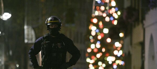 A policeman patrols in the rue des Grandes Arcades in Strasbourg, eastern France, after a shooting breakout, on December 11, 2018. - Sputnik International