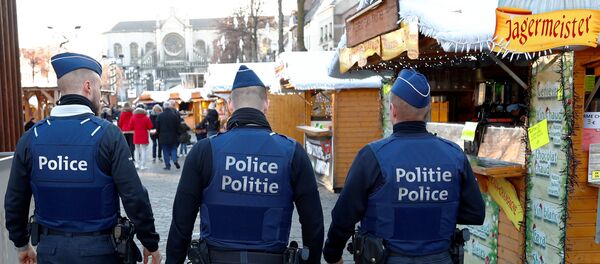 Belgian police officers patrol the area of Christmas market in central Brussels, Belgium, December 12, 2018 Belgian police officers patrol the area of Christmas market in central Brussels, Belgium, December 12, 2018 - Sputnik International