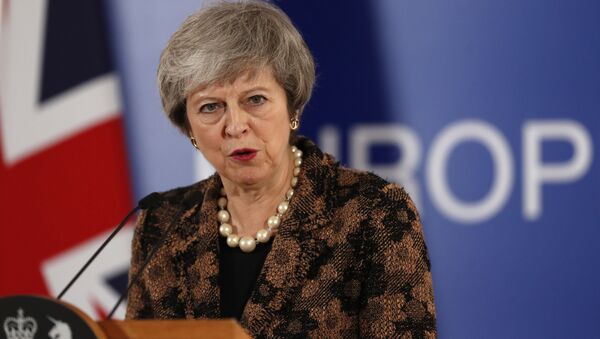 British Prime Minister Theresa May speaks during a media conference during an EU summit in Brussels, Friday, Dec. 14, 2018. - Sputnik International
