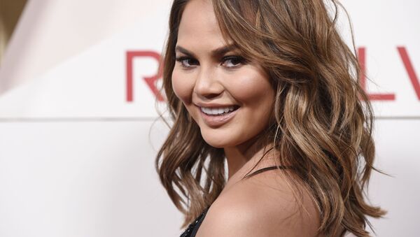 FILE - In this 2 November 2017 file photo, model Chrissy Teigen poses at the 2017 Revolve Awards at the Dream Hollywood hotel in Los Angeles. - Sputnik International