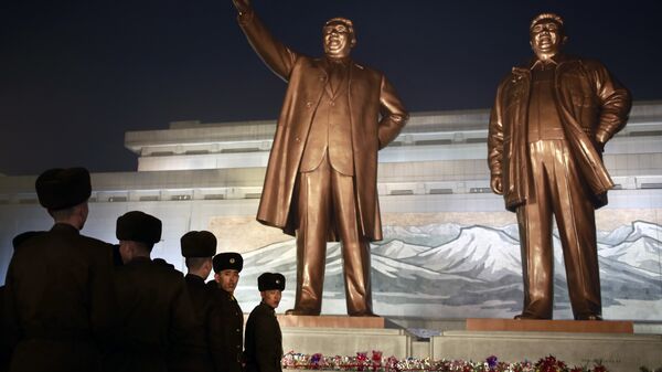 North Korean soldiers line up as they pay respect to the bronze statues of their late leaders Kim Il Sung and Kim Jong Il at Mansu Hill Grand Monument in Pyongyang, North Korea, Sunday, Dec. 16, 2018. Many North Koreans are marking the seventh anniversary of the death of leader Kim Jong Il with visits to the statues and vows of loyalty to his son, Kim Jong Un - Sputnik International