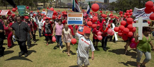 Some of the 400 White South Africans, holding placards reading No Farmer, No Food, No Future, march to protest the violent murder of farmers, which they term 'genocide', and 'oppressive' state policies in favour of Blacks in Pretoria on October 10, 2013 Some of the 400 White South Africans, holding placards reading No Farmer, No Food, No Future, march to protest the violent murder of farmers, which they term 'genocide', and 'oppressive' state policies in favour of Blacks in Pretoria on October 10, 2013 - Sputnik International