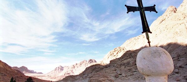 In this Wednesday, Jan. 7, 1998 file photo, the shadow of Mount Sinai stretches across the valley at the foot of the Greek Orthodox Monastery of St. Catherine in the Sinai peninsula some 240 miles southeast of Cairo, Egypt - Sputnik International