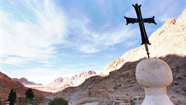 In this Wednesday, Jan. 7, 1998 file photo, the shadow of Mount Sinai stretches across the valley at the foot of the Greek Orthodox Monastery of St. Catherine in the Sinai peninsula some 240 miles southeast of Cairo, Egypt - Sputnik International