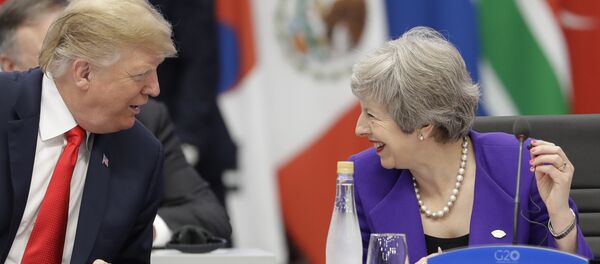 Britain's Prime Minister Theresa May, right, speaks with President Donald Trump during the G20 summit in Buenos Aires, Argentina, Friday, Nov. 30, 2018 Britain's Prime Minister Theresa May, right, speaks with President Donald Trump during the G20 summit in Buenos Aires, Argentina, Friday, Nov. 30, 2018 - Sputnik International