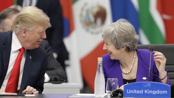 Britain's Prime Minister Theresa May, right, speaks with President Donald Trump during the G20 summit in Buenos Aires, Argentina, Friday, Nov. 30, 2018 - Sputnik International