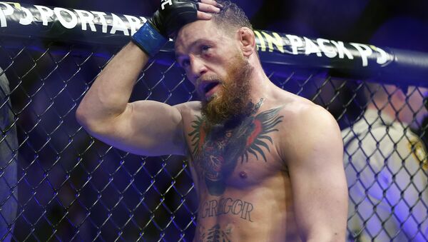 Conor McGregor reacts after losing to Khabib Nurmagomedov in a lightweight title mixed martial arts bout at UFC 229 in Las Vegas, Saturday, Oct. 6, 2018 - Sputnik International