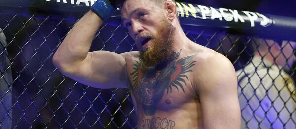 Conor McGregor reacts after losing to Khabib Nurmagomedov in a lightweight title mixed martial arts bout at UFC 229 in Las Vegas, Saturday, Oct. 6, 2018 - Sputnik International