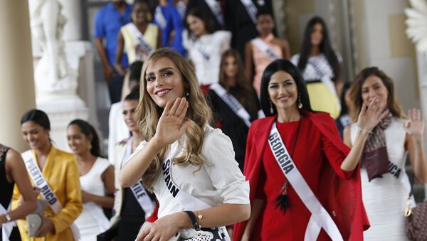 Miss Spain Angela Ponce, center, the first transgender woman to take part in the Miss Universe contest and with Miss Universe 2018 contestants visit the Government House in Bangkok, Thailand Tuesday, Dec. 11, 2018. - Sputnik International