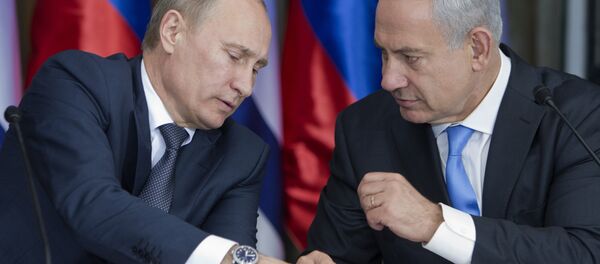 Russian President Vladimir Putin, left, speaks with Israeli Prime Minister Benjamin Netanyahu as they prepare to deliver joint statements after their meeting and a lunch in the Israeli leader's Jerusalem residence, Monday, June 25, 2012 Russian President Vladimir Putin, left, speaks with Israeli Prime Minister Benjamin Netanyahu as they prepare to deliver joint statements after their meeting and a lunch in the Israeli leader's Jerusalem residence, Monday, June 25, 2012 - Sputnik International