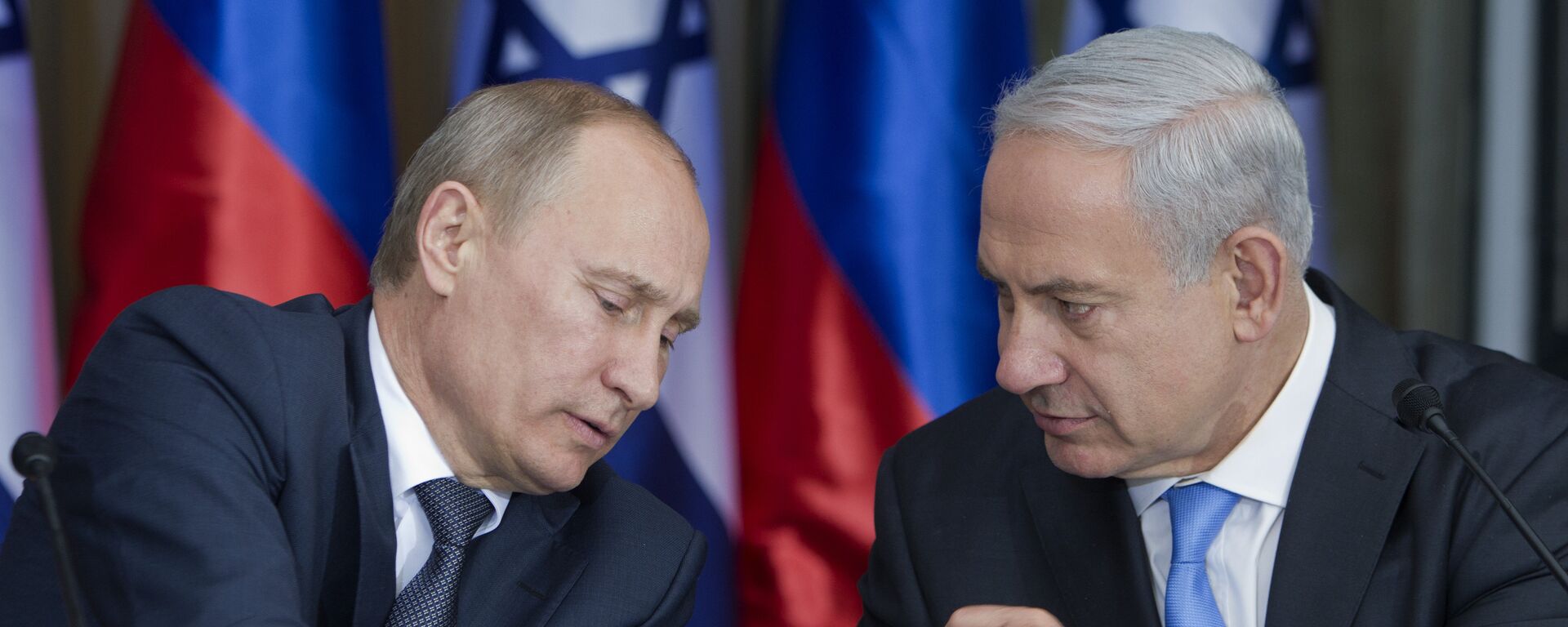 Russian President Vladimir Putin, left, speaks with Israeli Prime Minister Benjamin Netanyahu as they prepare to deliver joint statements after their meeting and a lunch in the Israeli leader's Jerusalem residence, Monday, June 25, 2012 - Sputnik International, 1920, 16.01.2026