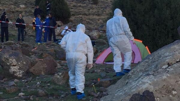 In this photo provided by Moroccan news channel 2M and taken on Tuesday, Dec. 18, 2018, a forensic team is seen at the area where the bodies of two Scandinavian women tourists were found dead, near Imlil in the High Atlas mountains, Morocco - Sputnik International