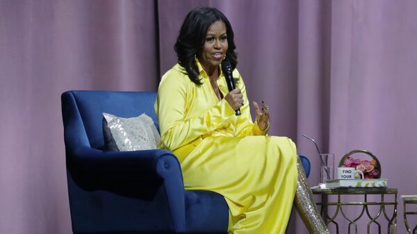 Former first lady Michelle Obama speaks as she is interviewed by Sarah Jessica Parker during an appearance for her book, Becoming: An Intimate Conversation with Michelle Obama at Barclays Center Wednesday, Dec. 19, 2018, in New York.  - Sputnik International